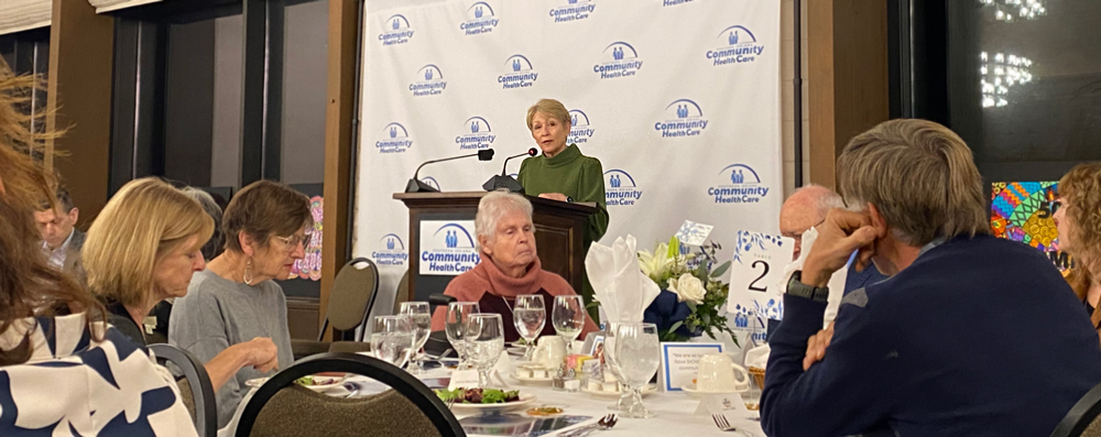 Dr. Sue Ellsperman delivering keynote speech to SICHC's 50th year anniversary dinner.